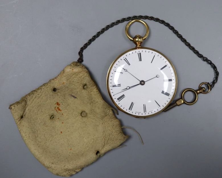 A continental engine turned 18k yellow metal open face keywind pocket watch, with Roman dial, diameter 46mm, gross 58.4 grams.